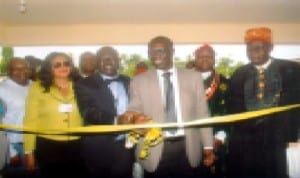 Manager, Occupational Health Mobil Producing Nigeria; Dr. Ayodele Fagbemi (3rd right) cutting a tape for official commissining of completed project at FAAN Medical Centre at Port Harcourt Int’l Airport, Omagwa recently. With him are Regional General Manager, FAAN, Mrs. Ebele Okoye (left), General Manager Medical, FAAN, Lagos, Dr. Oduwole Wale (2nd left), Paramount Ruler of Igwuruta, HRH. Eze (Prof.) Samuel N. Wekhe. Photo: Egberi A. Sampson