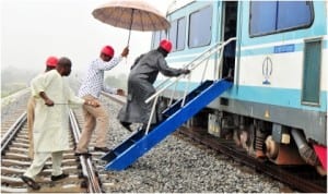 Chairman, Subsidy Reinvestment and Empowerment Programme (SURE-P), Retired Gen. Martin Lurther-Agwai (right), boarding a train during inspection of Light Rail Project in Abuja, last Friday