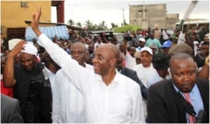 Rivers State Governor Chibuike Amaechi salutes the crowd in Rumukurushi community, during his 'meet the people tour of Communities in Obio/Akpor Local Government Area of the state, last Tuesday