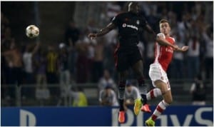 An aerial contest between Demba Ba of Besiktas and Arsenal’s Chambers in last night UEFA Champions League first leg play-off in Turkey