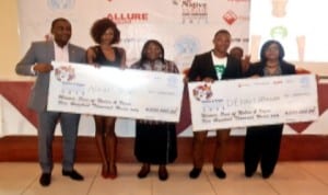 Participants at the 2014 Faces of Native and Vogue International Fashion Week with Permanent Secretary, Rivers State Ministry of Information, Mrs Cordelia Peterside (middle) in Port Harcourt recently.