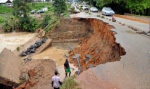 Erosion at Tasha 2, Gwagwa Karmo Road in Abuja last Friday. Photo: NAN