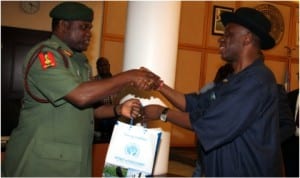 Rivers State Governor, Rt Hon Chibuike Amaechi (right) presenting a souvenir to the Chief of Army Staff, Lt-Gen Kennth Minimah, during his courtesy visit to Government House, Port Harcourt at the weekend.