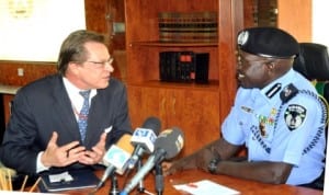 U.S. Deputy Chief of Mission, Mr Francis John-Bray (left) discussing with igp Suleiman Abba, during his  courtesy visit to Louis Edet House  in Abuja, recently. Photo: NAN