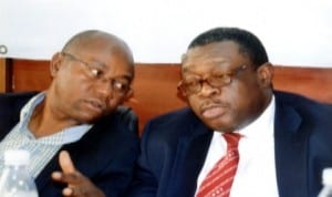 Managing Director, Resort Savings and Loans Plc, Mortgage Banks, Mr Abimbola Olayinka (right) chatting with the Deputy president, Port Harcourt Chamber of Commerce, Industry, Mine and Agriculture and former Commissioner of Health Rivers State, Dr Emi Membere (left) during the council meeting of PHCCIMA in Port Harcourt recently. Photo: Egberi A. Sampson