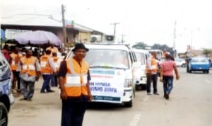 Head of Public Affairs Department, Rivers State Waste Management Agency, Mr Tam Konacree (front) leading the awareness campaign to Road/Streets in Port Harcourt, recently. Photo: Chris Monyanaga