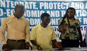 Spokesman Eastern Delta people Association Mr. Kingsley Adomie –Pepple (middle) addressing participants, during the nine (9) LGA coordinators inauguaration  last Friday  at Delta Hotel PHC with him is Ms Florence Kalio (right) any participants. Pix: Nwiueh Donatus Ken. 