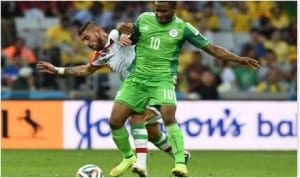 Super Eagles’ Mikel Obi (10) in contest with Iran’s Degajah at the 2014 World Cup. The Eagles are in Calabar preparing to face Congo in 2015 AFCON qualifier on Saturday