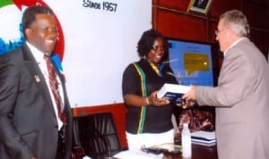 Airfrance, District Manager, South-East Nigeria, Peyo Labeguerie (right), presenting a souvenir to Executive Chairman,  Rivers State Internal Revenue Service, Onene Osila Obele-Oshoko (middle), at the PHCCIMA council meeting,  recently. With  them is President, PHCCIMA, Engr Emeka Unachukwu. Photo: Egberi. A. Sampson