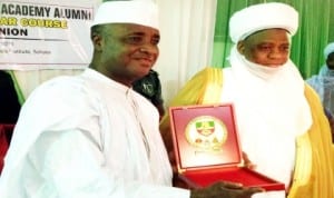 Governor  Aliyu Wamakko of Sokoto State (left), receiving a souvenir from Sultan of Sokoto, Alhaji Sa'ad Abubakar 111 for attending the Nigerian Defence Academy Alumni 18th Regular Course Re-Union in Sokoto, recently.