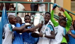 Enyimba players celebrating with the Federation Cup trophy last year. They will face Dolphins in the final match of the 2015 edition on September 28