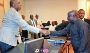 Rivers State Governor, Chibuike Amaechi (left) congratulating the chairman Care-Taker Committee, Ogu/Bolo LGA, Hon Mina Tende, during the swearing-in ceremony at Government House, Port Harcourt, last Tuesday