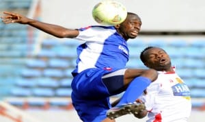 A Nigerian Premier League action between Sharks of Port Harcourt and Rangers International of Enugu.