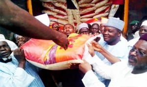 Nigeria's Ambassador to Morocco, Sen. Abdallah Wali (right), presenting N60m worth of rice to Sokoto State in Sokoto, recently. Photo: NAN