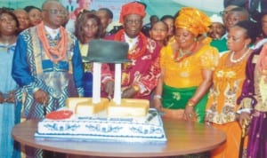 Chairman, Rivers State Council of Traditional Rulers and Gbenemene of Tai Kingdom, President Supreme Council of Ogoni Traditional Rulers. HM King Godwin N.K. Gininwa (middle) his wife, Queen Grace Gininwa, other members of family and HM King Kaleh O.M. Obuge cutting the cake, during the thanksgiving service to mark the 75th Diamond Birthday Aniversary at Dr. Obi Wali International Conference Centre, Port Harcourt last Saturday. Photo: Chris Monyanaga