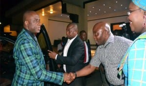 Rivers State Governor, Rt Hon Chibuike Amaechi (left) being welcomed to the 2014 Native and Vogue Port Harcourt International Fashion Week by member of House of Representatives, Honourable Asita, while the Commissioner for Information and Communications, Mrs Ibim Semenitari watches, last Friday in Port Harcourt. Photo: Ibioye Diama