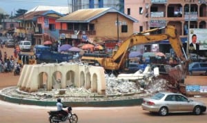 Demolition of Arroma Roundabout, Awka, on the Enugu -Onitsha Expressway, recently. Photo: NAN