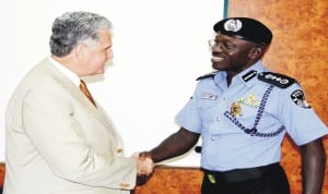 Acting IGP Suleiman  Abba (right), welcoming British High Commissioner to Nigeria, Mr Andrew Pocock to his office, during the High Commissioner's visit in Abuja, recently.