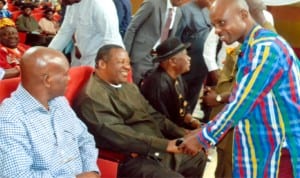 Chairman Caretaker Committee, Gokana Local Government  Area of Rivers State, Hon Sylvester Vidin (right), in a hand shake, with Justice Peter Akete (rtd),  while other personalities watch, during the thanksgiving service to mark the 75th Birthday Anniversary chairman, Rivers State council of Traditional Rulers,  King G.N.K Giniwa at Dr. Obi Wali International Convention Centre, Port Harcourt, recently. Photo: Chris Monyanaga.