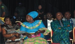 L-R: Rivers State Governor, Rt Hon Chibuike Amaechi, Commissioner for Information and Communications,Mrs Ibim Semenitari and a guest at the Native and Vogue Port Harcourt  International Fashion Week in Port Harcourt, recently.