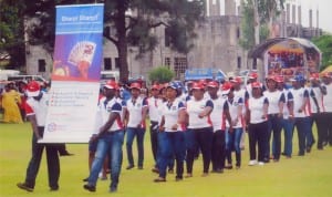 Staff of Credit Direct, participating in a march past, during a public event in Port Harcourt recently.