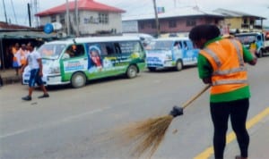 A road sweeper domostrating the cleaness of road/streets in Port Harcourt, during the awareness campaign by the Rivers State Waste Management Agency, recently. Photo: Chris Monyanaga