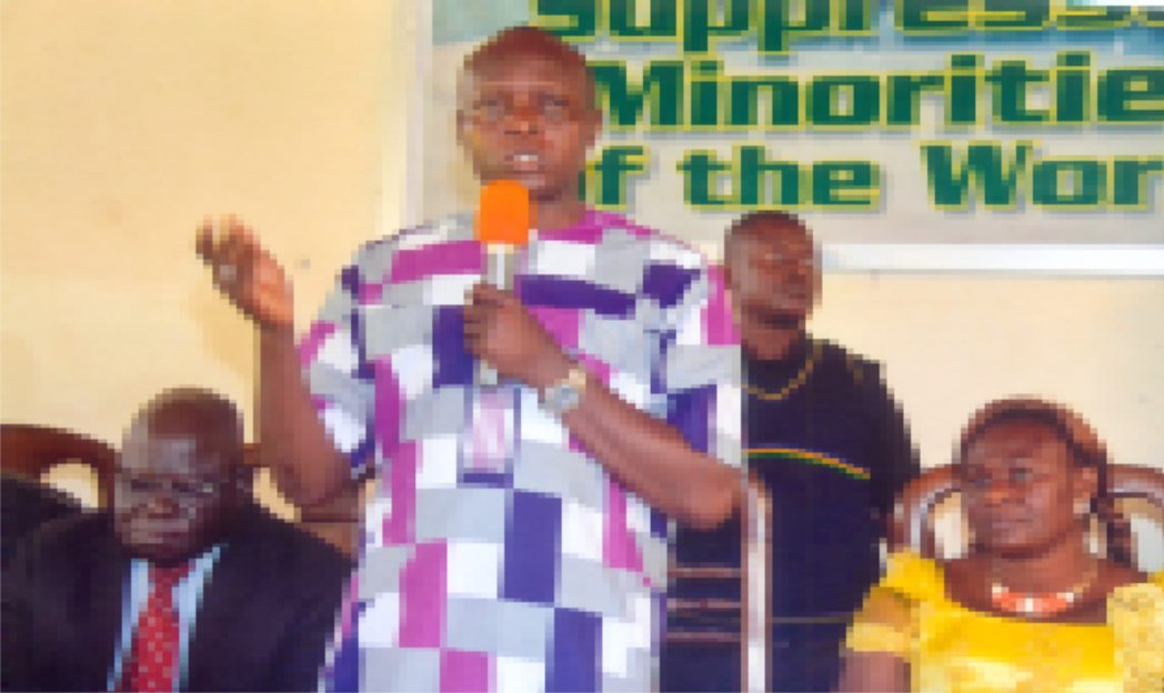 Chairman, Caretaker Committee, Khana Local Government Area of Rivers State, Hon. Gordon Tornwe (standing), addressing the people at the inuguration of his caretaker committee members in Bori recently. With him are Justice A. A. Ebe of the Bori High Court (left) and wife of the CTC Chairman, Mrs Tornwe wife of CTC Chairman.. Photo: Chris Monyanaga