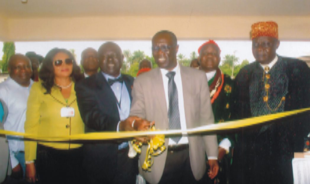 Manager, Occupational Health, Mobil Producing Nigeria, Dr. Ayozele Fagbemi (3rd right) cutting a tape for official commissioning of completed project at FAAN medical centre at Port Harcourt Int’l Airport, Omagwa. With him are Regional General Manager, FAAN, Mrs. Ebele Lagos, Dr. Oduwole Wale (2nd left), Paramount Ruler Igwuruta, HRH. Eze Prof. Samuel N. Wekhe, recently. Poto: Egberi A. Sampson