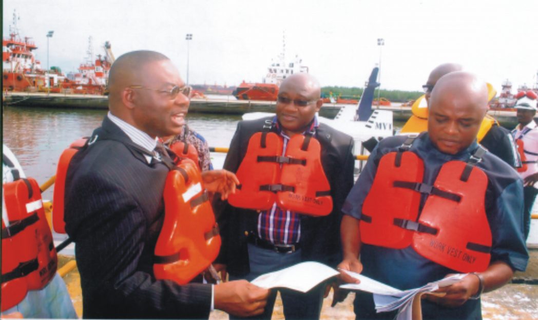 L-R: General Manager, SDCR, Shell Pet. Dev. Company of Nig. Ltd., Mr. Nezo Osayande, Government and Communities Relations, MGR, Bayelsa and Delta, Mr. Evans Krukrubo, with chiarman, Agbidiama CTC, Hon. Emmanuel Fungewei, during the commissioning of Agbidiama landing craft at SPDC Marine Base, Kidney Island, Port Harcourt, recently. Photo: Egberi A. Sampson
