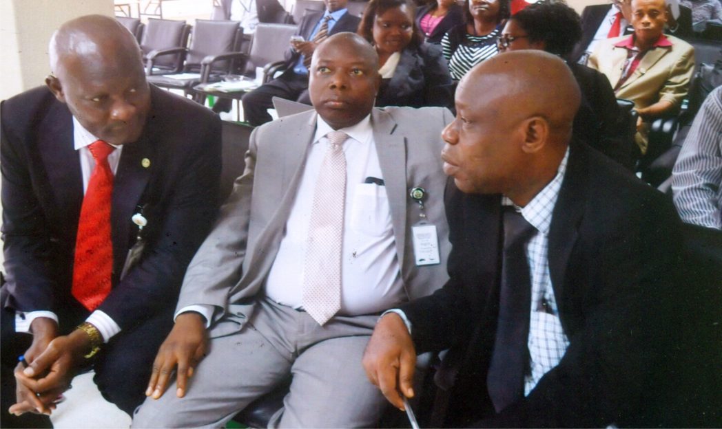 Assistant Director, Development and Finance Department, CBN Head Office, Abuja, Mr Babatunde Ogunlaja (left), with Assistant Director, Banking and Payments Dept (middle) and Manager, NAICOM, Port Harcourt, Mr. Emma Ndukuba, at a workshop on Financial Inclusion organised by CBN in Port Harcourt, yesterday. Photo: Chris Monyanaga