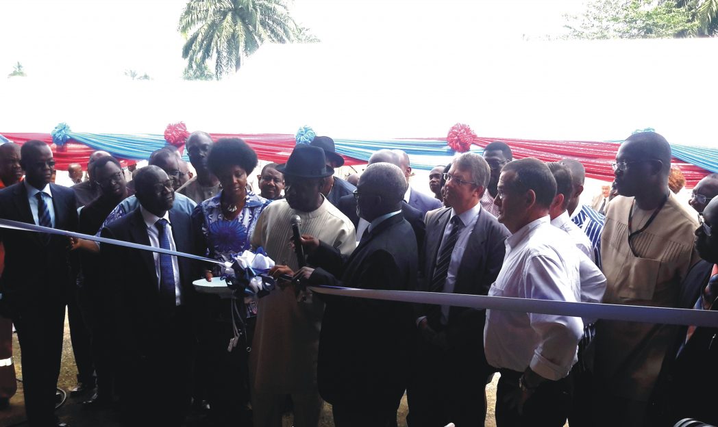 Executive Secretary, NCDMB, Ernest Nwakpa,, cutting the tape to inaugurate Benkline workshop in Port Harcourt, last Thursday. He is flanked by Chairman, Board of Directors, Benkline, Larry Osai (with mic), Jean-Claude Vachet of Total (3rd right), Thierry Bunel-Gourdy of Eurofiliales (2nd right) and General Manager, NCD, Shell Nigeria, Igo Weli (right).