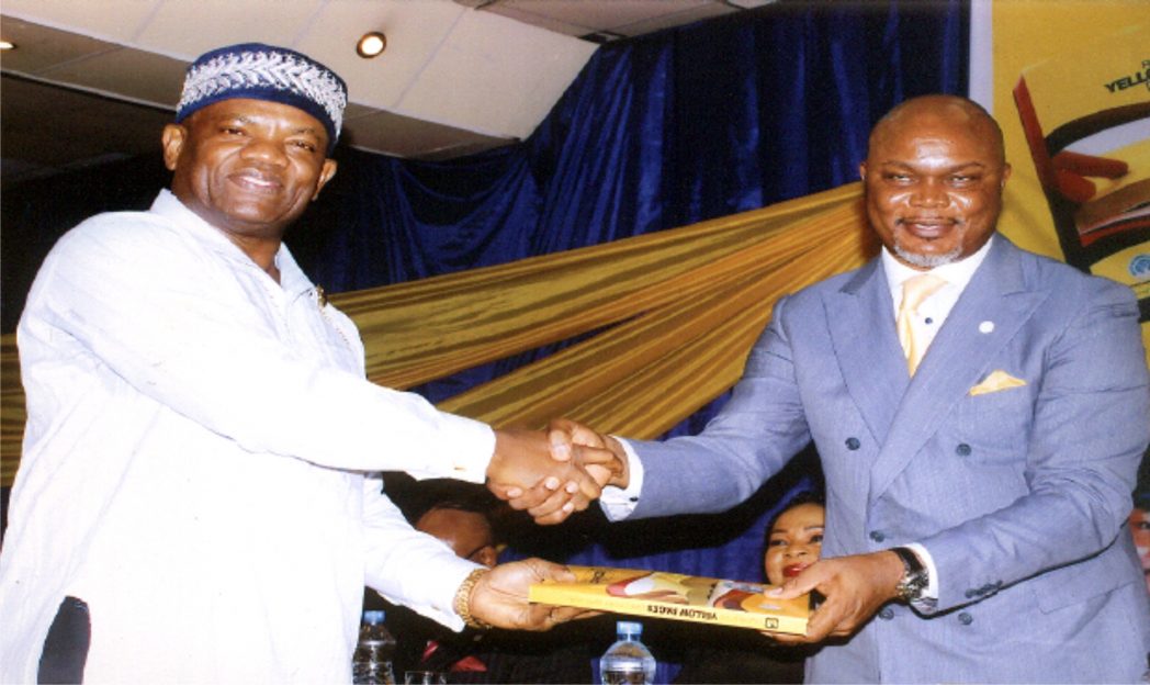 Rivers State Commissioner for Commerce and Industry, Hon. Chuma C. Chinye (right) and Administrative Director, MCC, Mr. Nelson Jaja (left) at the public presentation of the yellow pages Directory, organised by Ministry of Commerce and Industry, Port Harcourt last week