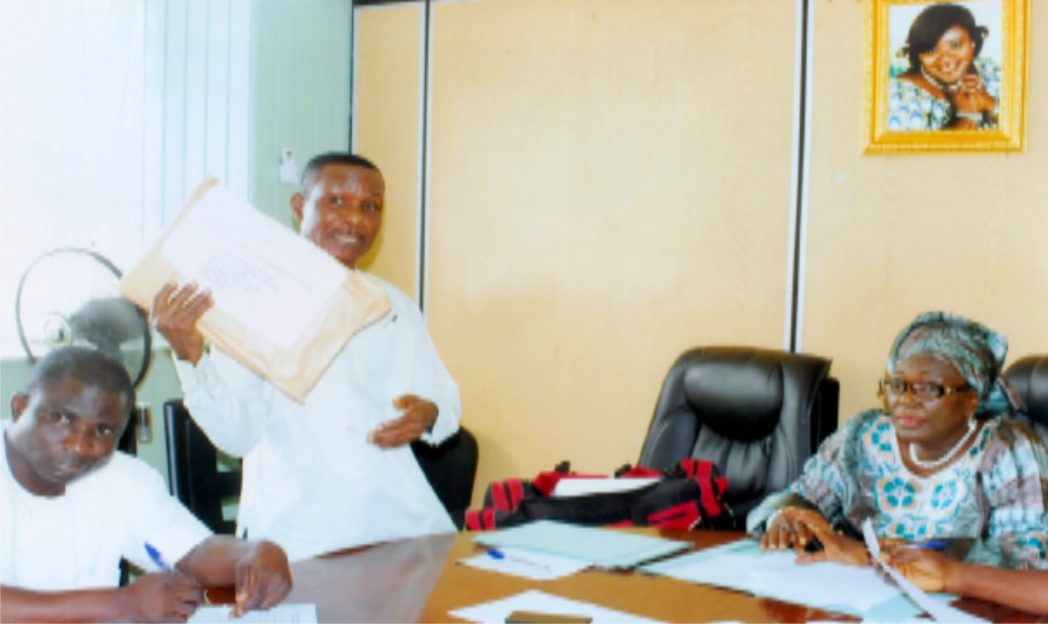 Director of Planning Research and Statistics, Ministry of Information and Communciations, Mr Rufus Direh (middle) speaking during the bidding of the 2015 Calender/Diaries at the ministry recently. With him are Permanent Secretary of the ministry, Mrs Cordelia Peterside (right) and Director, Government Press, Bello Olatunde. Photo: Egberi .A. Sampson
