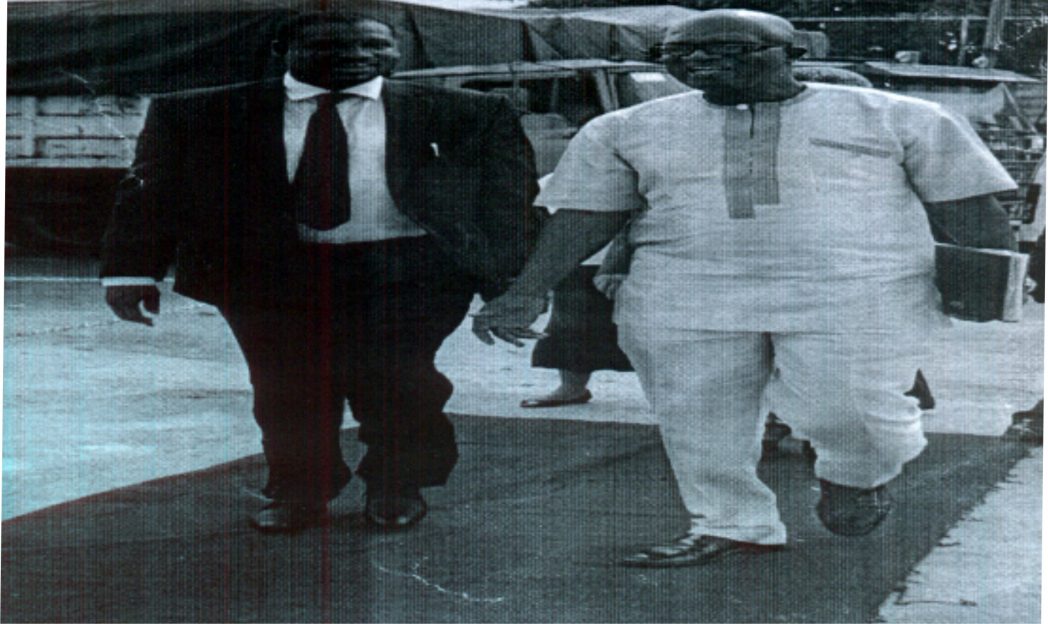 Dr. Abba Ibraham, Commissioner, Government and Consumer Affairs, NERC (left) on arrival with Johnkin Achife, Director, Distribution Services, PHED to the commissioning of the new customer care centre in Port Harcourt recently.