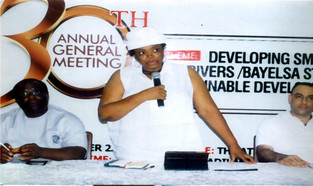 Chairman, Manufacturers Association of Nigeria, Rivers/Bayelsa States branch, Mrs Ekama E. Akpan (middle) addressing the press, during the 30th Annual General Meeting of the body in Port Harcourt. With her is Chief Nabil Saleh (right) and 1st Vice Chairman of MAN, Hon Charles Beke.