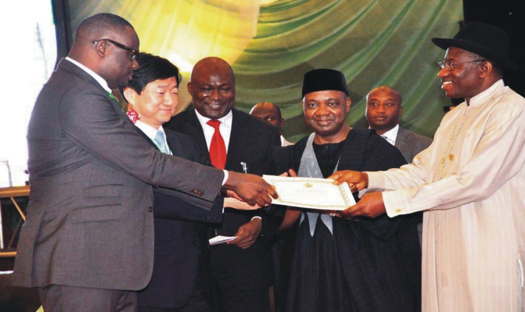 President Goodluck Jonathan (right), Vice-President Namadi Sambo (2nd right), presenting certificates and licences to new core owners of Phcn Successor Companies, Mr Kola Adesina Of Sahara Group (left) and the Managing Director, Korea Electronic Power Corporation, Mr So Taisup (2nd left) in Abuja recently. With them is the Director-General, Bureau for Public Enterprises, Mr Benjamin Dikki.