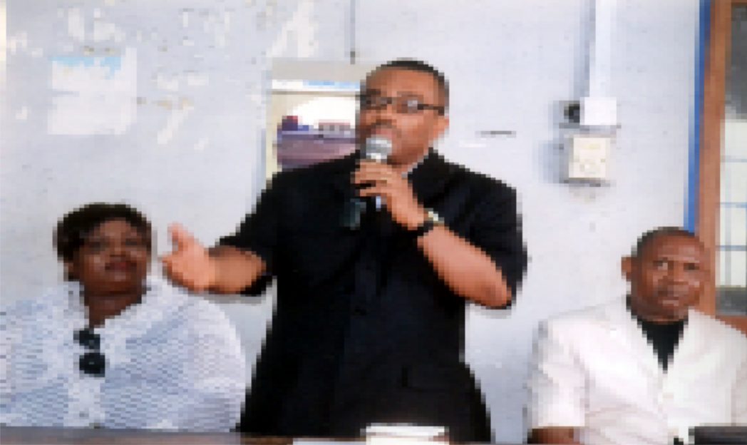 General Manager, Rivers State Newspaper Corporation, Mr Celestine Ogolo (middle), addressing staff of the corporation, during the 2015 Dedication Service of the corporation in Port Harcourt, yesterday. With him are Pastor Nimah Simon Neebari (right) and Director, Publications, Mrs Juliet Njiowhor. Photo: Egberi A. Sampson