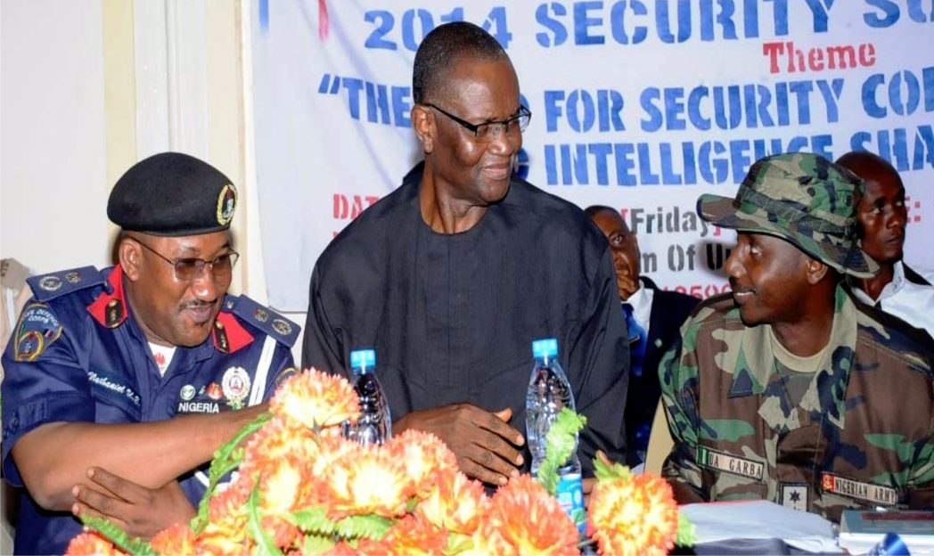 L-R: Commandant, Nigeria Security and Civil Defence Corps (NSCDC) Enugu State, Mr Nathaniel Ubong, Representative of Enugu State Government, Mr Chime Richard and Representative of Commandant, Nigerian Army 82 Garrison, Capt. Umar Garba, at the 2014 Security Summit organised by NSCDC in Enugu, recently.