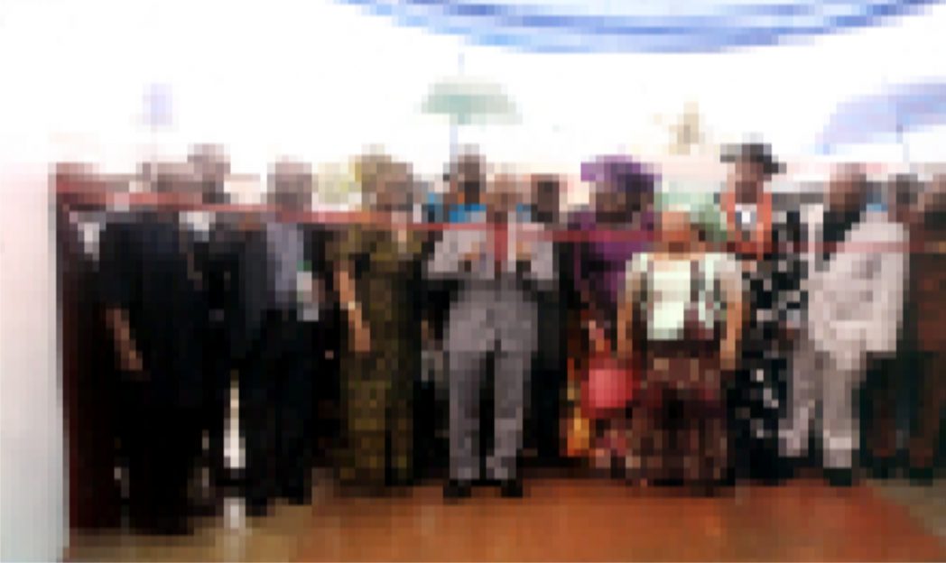 The Assistant Regional Eck Spiritual Aide, Nigeria, Odoliyi Lolomari (middle) flanked by former Director, Buisness Development, Rivers State Newspaper Corporation, Vincent Ochonma and others cutting tape to commission Chanhassen Lodge, a two-star hotel in Port Harcourt, recently.
