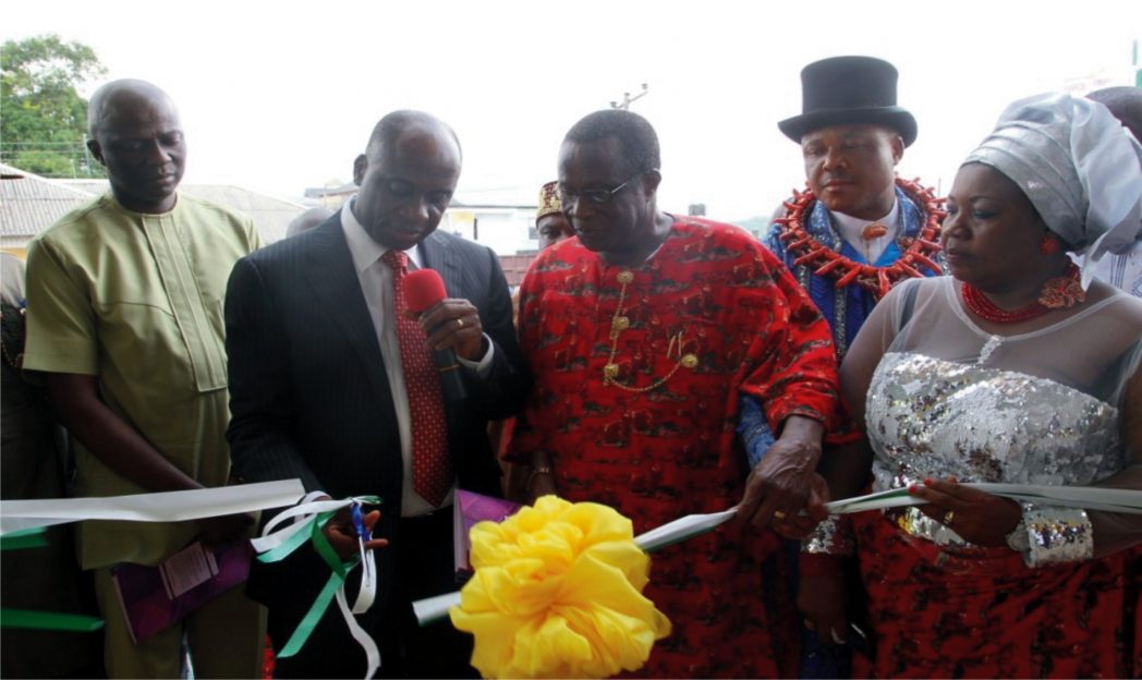 Rivers State Governor, Chibuike Rotimi Amaechi (right),  with High Chief Jonah Tamuno and Ogu/Bolo Council Chairman, Hon (Mrs) Maureen Tamuno at the commissioning of an electricity project in Ogu/Bolo Local Government Area recently.