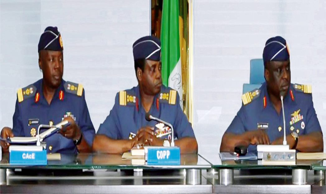 Representative of the Chief Of Aircraft Engineering, Air Commodore Kayode Beckley; Chief of Air Staff, Air Marshal Adesola Amosu and Chief of Policy and Plans, Avm James Gbum, at a media briefing on Commemoration of the 50th Anniversary of the Nigerian Air Force in Abuja recently.