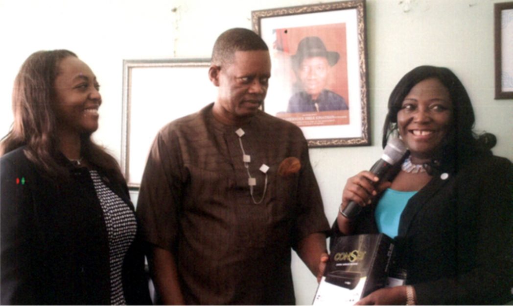 Out-going Permanent Secretary, Rivers State Ministry of Information and Communications, Mrs Cordelia Peterside (right), presenting a consat record er to Comrade Pedro chindah, yesterday in Port Harcourt. With them are Director, IT $ Operations, Consat, Oluwa Funmi-Ola Adewon.Photo: Egberi A. Sampson
