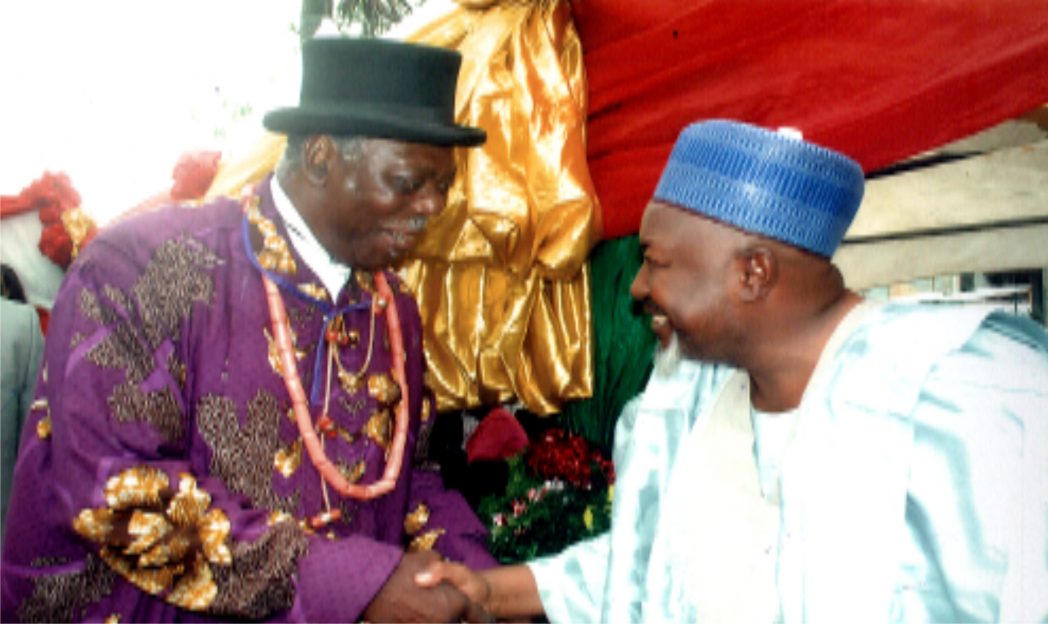 Life Vice President of PHCCIMA and Amanyanabo of Twon Brass, HRM Alfred Diette Spiff (left) in a hand shake with National President, NACCIMA, Alh Mohammed Badaru Abubakar, during the opening ceremony of the 9th Port Harcourt International Trade Fair in Port Harcourt recently.