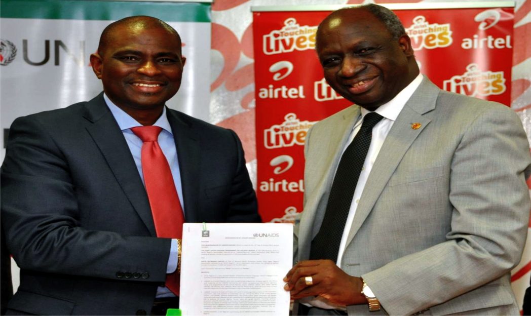 Chief Executive Officer and Managing Director, Airtel Nigeria, Segun Ogunsanya and Country Director, UNAIDS, Dr. Bilali Camara during the signing ceremony of a Memorandum of Understanding between UNAIDS and Airtel to eliminate Mother-to-Child transmission of HIV in Nigeria, at the Corporate headquarters of Airtel Nigeria, yesterday, in Lagos.