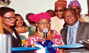 Minister of Finance and Coordinating Minister for the Economy, Dr Ngozi Okonjo-iweala (middle), inaugurating the Pensioners Call Centre in Abuja last Thursday. With her are: Director-General, Pension Transitional Arrangement Directorate, Mrs Nellie Mayshak (left); Director, Pensioner Support, Mrs Roz Ben-Okagbue (2nd left); Representative of the President, Nigerian Union of Pensioners, Mr Musa Dallato  (2nd right) and Director-General, Budget Office, Dr Bright Okogu (right). Photo: NAN