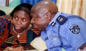 Rresident INEC Commissioner Rivers State, Mrs De Sila Khan (left) exchanging views with the Commissioner of Police, Rivers State, Mr. Dan bature during a political peace accord organised by AIG incharge of Zone six at Port Harcourt, recently.        Photo: Nwiueh Donatus Ken