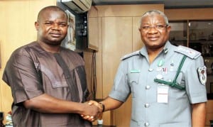 Comptroller-General of Customs (cgc), Alhaji Dikko Abdullahi (right), welcoming the Managing Director, News Agency of Nigeria (nan), Mr Ima Niboro to his office, during a courtesy visit to Customs Headquarters in Abuja last Tuesday.                     Photo: NAN