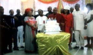 Presiding Bishop of Kingdom Life Gospel Church, Port Harcourt, Bishop Victor Uzosike (4th left), his wife (3rd left) cutting his 48th birthday cake in Port Harcourt recently. With them are Port Harcourt ASUU Zonal Coordinator, Prof Beke Sese (2nd right) and other dignitaries.