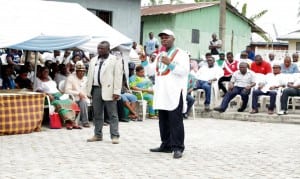 APC governorship candidate in Rivers State, Dr. Dakuku Peterside (right), addressing party supporters in Finima Community, during his ward rally in Bonny Local Government Area.