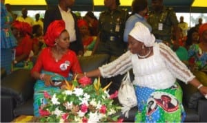 Wife of APC governorship candidate in Rivers State, Barr. (Mrs.) Elima Peterside,  discussing with  wife of Executive Governor of Rivers State, Dame Judith Amaechi, during a town hall meeting with women at Emohua LGA